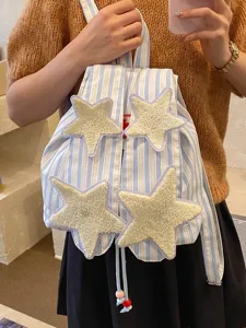 Casual blue and white striped backpack with cute plush star patches and convenient drawstring.