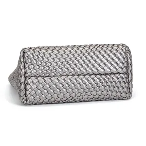 Metallic silver woven leather handbag detail, soft texture and exquisite handmade craftsmanship.