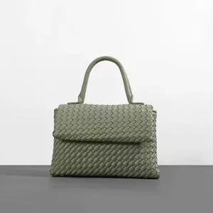 Elegante geweven lederen handtas voor dames, prachtige vintage tas met unieke textuur.