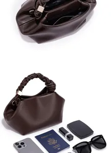 Dark brown leather handbag with braided handle, stylish dumpling pouch design for women daily use.