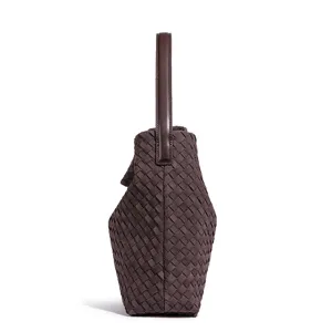 Handmade woven leather shoulder bag, large capacity stylish tote bag for daily commute.