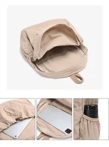 Detail view of khaki nylon backpack showing interior compartment, zipper, and side pocket.