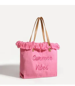 Bolso tote de lona rosa con un detalle de flecos elegantes y bordado Summer Vibes.