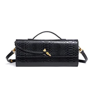 Black snake pattern evening handbag for women, stylish horizontal shoulder crossbody bag with gold detail.