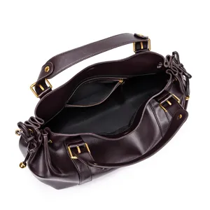 Detailed top-down view of the dark brown soft leather tote bag, showcasing interior pocket and hardware.