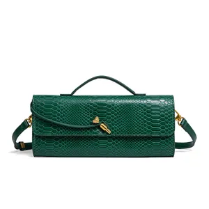 Green snake print shoulder bag for women, trendy rectangular evening clutch with top handle.
