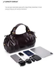 Vintage brown leather tote bag with large capacity, slouchy shoulder bag for daily commuting.