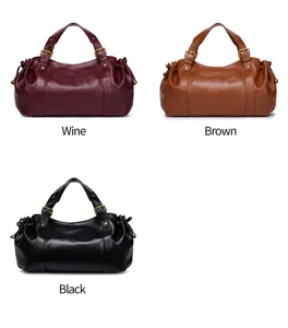 Details of the soft leather vintage handbag with pleats and metal buckle in multi colors.
