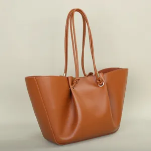 Brown PU leather large capacity tote bag with pleated design and double handles for women.