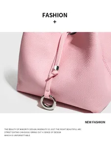 Bolso cubo de cuero rosa con cordón de anillo metálico, bolso de mano elegante para mujer.