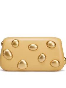 Women's yellow leather clutch bag with creative gold pebble metal studs for luxury evening parties.