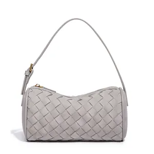 Grijze suède geweven ton handtas, chique casual schouder kussen tas voor dagelijkse mode.