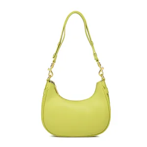 Chique limoengroene hobo-schoudertas voor dames, trendy halve maan baguette tas met goud.