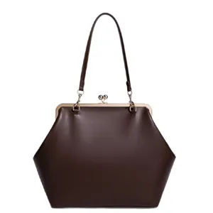 Klassische dunkelbraune Kissentaschen Schultertasche mit Metallrahmen und Henkel für Damen Alltag.