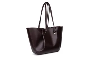 Close-up detail of the dark brown leather tote bag with unique gathered pleated design.
