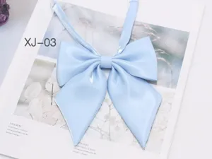 Light blue shiny JK uniform bow tie, pointed collar accessory detail, sweet student style.