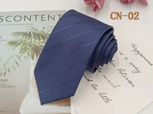 Detailed view of the dark blue striped business tie, showing fine jacquard texture and fabric.