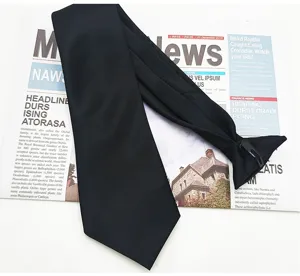 Close-up of the solid black pre-tied clip tie showing fabric texture and neat stitching details.