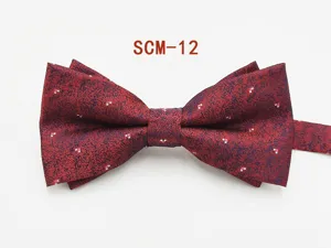 Detailed view of the red double-layer men's bow tie, showing fine fabric texture and pattern.