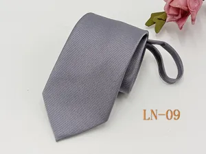 Grey striped zipper necktie detail shot, showing jacquard fabric texture and easy-pull design.