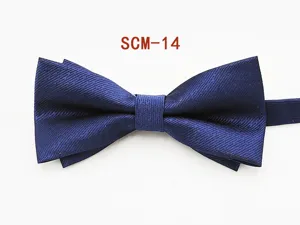 Detailed closeup of a classic blue textured bow tie, perfect formal wear accessory for men.