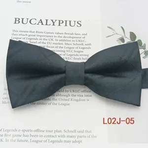 Detailed view of dark blue polyester jacquard striped bow tie for men business leisure use.