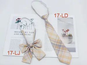 Japanese JK uniform plaid tie and bow tie set, yellow and grey tartan fabric for daily wear.