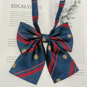 Korean style JK uniform bow tie with navy red stripes and cute embroidered crest for students.