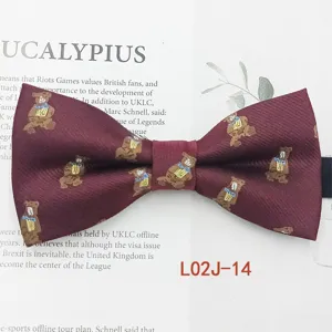 Burgundy jacquard bow tie featuring adorable bear pattern, detailed men's fashion accessory.