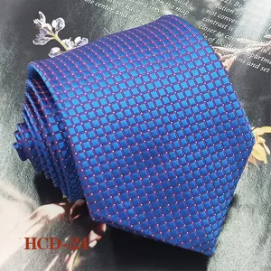 Blue checkered jacquard necktie detail view, premium textured fabric close-up shot.