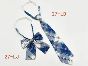 Detailed view of the Japanese style blue plaid tie and bow set with adjustable strap.