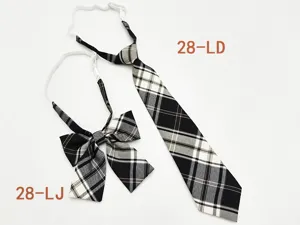 Detail view of Japanese JK uniform plaid necktie and bow tie set with adjustable strap.