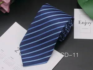 Close-up detail of men's business striped necktie in deep blue with light blue diagonal stripes.