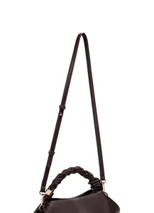 Detailed view of the dark brown women's crossbody bag featuring a stylish braided handle.