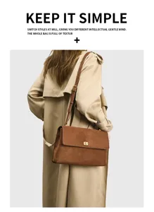 Detail view of the vintage brown suede shoulder bag showing metal turn-lock and texture.