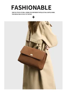 Vintage brown suede shoulder bag for women, large capacity commute underarm bag style.