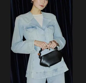 Stylish women shoulder bag featuring a unique braided handle and chic design for daily wear.