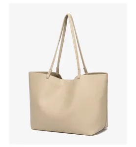 Zachte PU lederen vrouwen shopper tas, grote minimalistische schoudertas mode design detail.