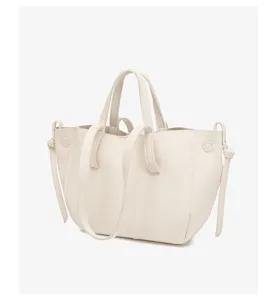 Gedetailleerd overzicht van de elegante litchi patroon lederen tas voor dagelijks gebruik.