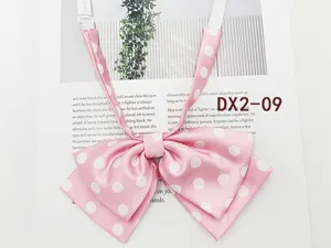 Pink polka dot bow tie detail, sweet JK uniform accessory with adjustable strap and smooth satin.
