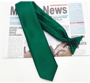 Close-up detail of dark green pre-tied men tie with clip and adjustable strap for suit.