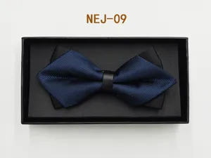 Detailed view of the layered blue and black bow tie inside a black gift box, elegant design.