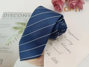 Blue striped men's formal business tie, elegant polyester jacquard design for professional wear.
