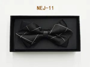 Detailed view of the black grid bow tie in a gift box, elegant design for formal menswear.