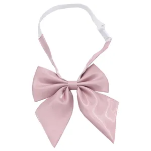 Pink glitter JK bow tie with adjustable white strap for school uniforms and sweet daily outfits.