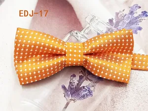 Kids orange polka dot bow tie, stylish polyester fabric bowtie for children and pets daily wear.