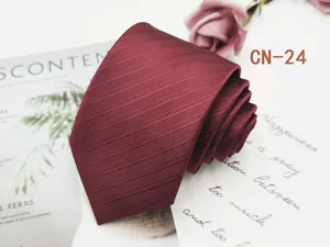 Burgundy striped men's necktie detail shot, showing fine textured fabric and neat folding.