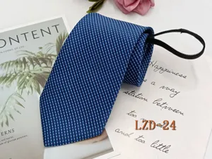 Blue dotted pattern men zipper necktie detail shot, convenient pre-tied design for easy wear.