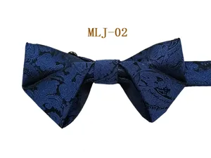 Detailed view of the dark blue paisley men formal bow tie showing exquisite jacquard texture.