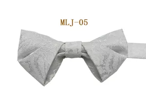 Men's silver jacquard bow tie close-up detail, elegant formal wear accessory view.